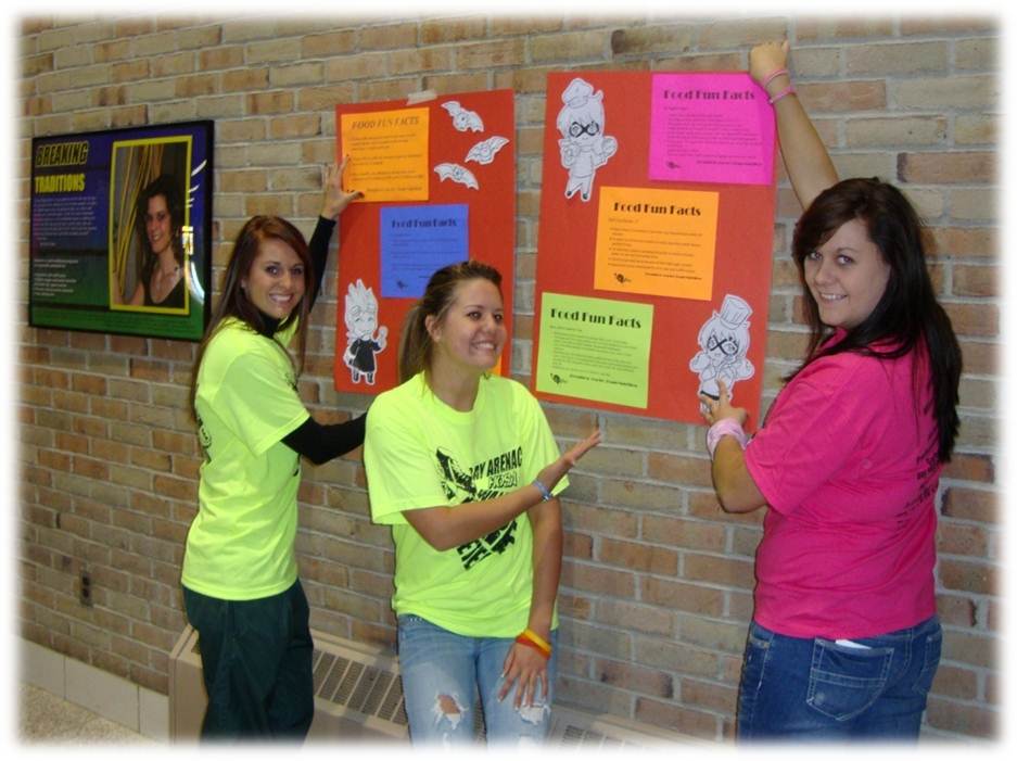 Career Center Students Hanging Posters